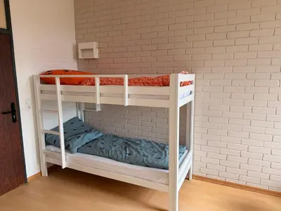 Ein Bett oder Betten in einem Zimmer der Unterkunft Waldherberge Sargenroth