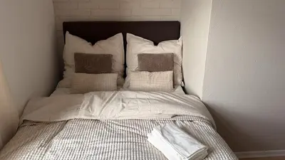 Ein Bett oder Betten in einem Zimmer der Unterkunft Waldherberge Sargenroth