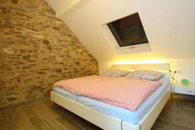 Ein Bett oder Betten in einem Zimmer der Unterkunft Alte Scheune Bruns