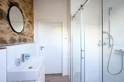 Ein Badezimmer in der Unterkunft Alte Scheune Bruns