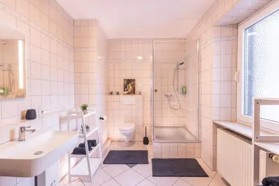 Ein Badezimmer in der Unterkunft Basalt-Suite