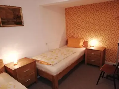 Ein Bett oder Betten in einem Zimmer der Unterkunft Weingut Steffen Erben