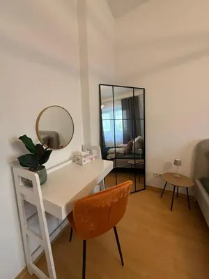 Ein Sitzbereich in der Unterkunft Koblenz City - 3-Zimmer Apartment an der Balduinbrücke