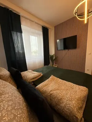 Ein Bett oder Betten in einem Zimmer der Unterkunft Koblenz City - 3-Zimmer Apartment an der Balduinbrücke