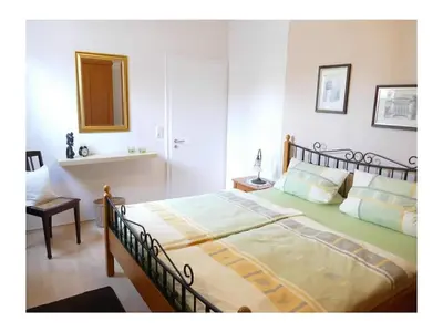 Ein Bett oder Betten in einem Zimmer der Unterkunft 4-star holiday apartments Weber