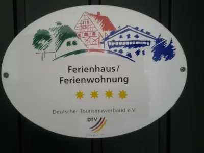 Ein Zertifikat, Auszeichnung, Logo oder anderes Dokument, das in der Unterkunft 4-star holiday apartments Weber ausgestellt ist