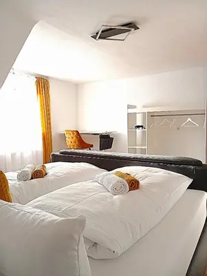 Ein Bett oder Betten in einem Zimmer der Unterkunft DANESSI Urlaub Business nahe Industriegebiet und Koblenz 2 OG