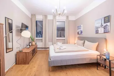Ein Bett oder Betten in einem Zimmer der Unterkunft Bad Ems City Apartment nahe Therme und Zentrum