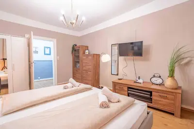 Ein Bett oder Betten in einem Zimmer der Unterkunft Bad Ems City Apartment nahe Therme und Zentrum