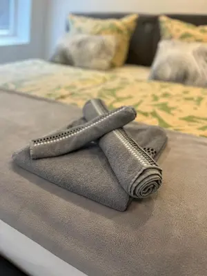 Ein Bett oder Betten in einem Zimmer der Unterkunft Riverside-Appartements
