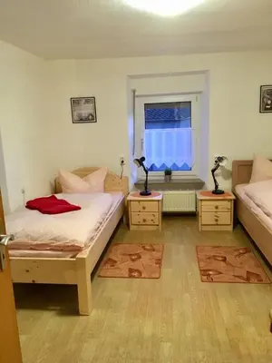 Ein Bett oder Betten in einem Zimmer der Unterkunft Landhaus Düngenheim