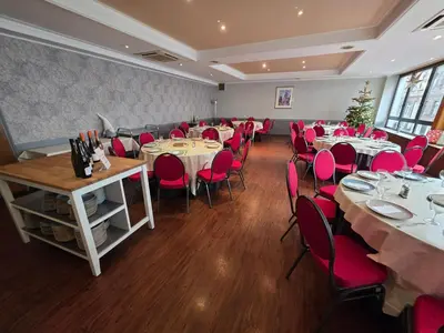 Ein Sitzbereich in der Unterkunft Hotel Montag