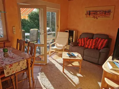 Ein Sitzbereich in der Unterkunft Haus Sonne