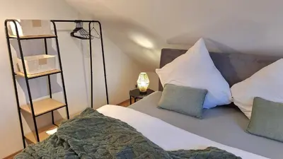 Ein Bett oder Betten in einem Zimmer der Unterkunft Ferienwohnung Ringwall