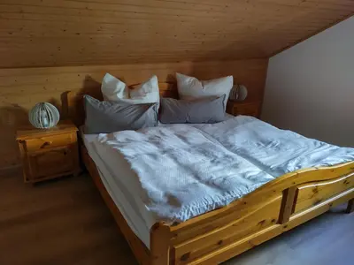 Ein Bett oder Betten in einem Zimmer der Unterkunft Dorfschönheit