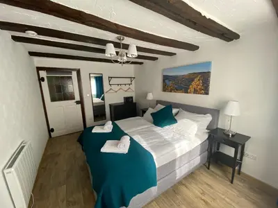 Ein Bett oder Betten in einem Zimmer der Unterkunft Mosel Röschen