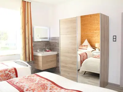 Ein Bett oder Betten in einem Zimmer der Unterkunft Holiday Home Modernes Ferienhaus in Daun by Interhome