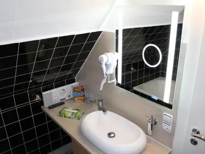 Ein Badezimmer in der Unterkunft Apartment Schöne Ferienwohnung in Daun mit Garten by Interhome