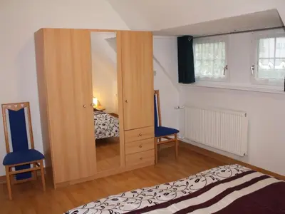Ein Bett oder Betten in einem Zimmer der Unterkunft Apartment Schöne Ferienwohnung in Daun mit Garten by Interhome