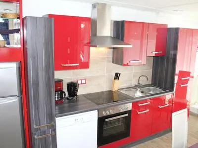 Küche/Küchenzeile in der Unterkunft Holiday Home City FH Vulkaneinfel by Interhome