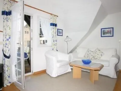 Ein Sitzbereich in der Unterkunft Apartment FEWO Veilchen by Interhome