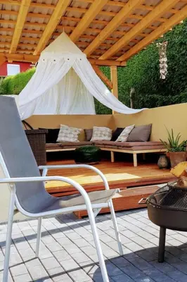 Ein Sitzbereich in der Unterkunft Holiday Home Wellness-Chalet by Interhome