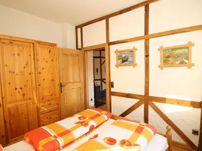 Ein Bett oder Betten in einem Zimmer der Unterkunft Apartment Simonis Privatpool by Interhome