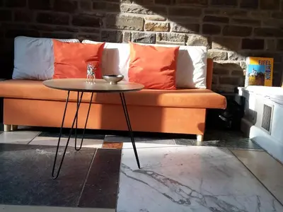 Ein Sitzbereich in der Unterkunft Apartment in Zendscheid mit Offenem Kamin by Interhome