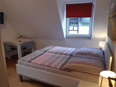Ein Bett oder Betten in einem Zimmer der Unterkunft Holiday Home Würzgarte by Interhome