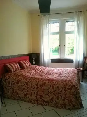 Ein Bett oder Betten in einem Zimmer der Unterkunft Ferienwohnung Mosel-Rhein