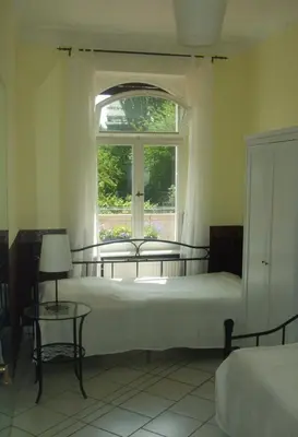 Ein Bett oder Betten in einem Zimmer der Unterkunft Ferienwohnung Mosel-Rhein