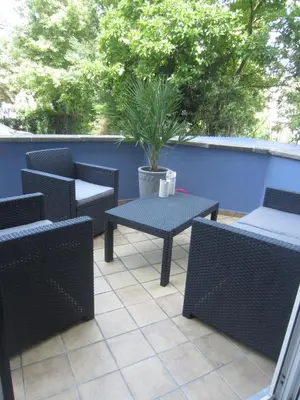 Ein Sitzbereich in der Unterkunft Ferienwohnung Mosel-Rhein