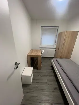 Ein Bett oder Betten in einem Zimmer der Unterkunft Häusliche Wohnung in Koblenz WE15