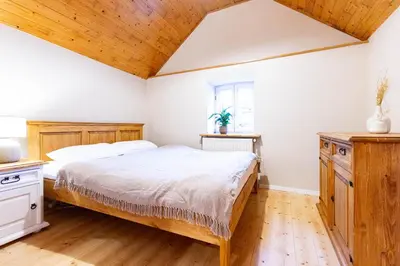 Ein Bett oder Betten in einem Zimmer der Unterkunft Charmantes Haus in Quiddelbach WLAN Smart Parken