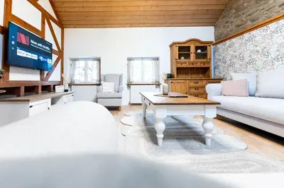 Ein Bett oder Betten in einem Zimmer der Unterkunft Charmantes Haus in Quiddelbach WLAN Smart Parken