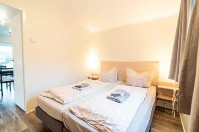 Ein Bett oder Betten in einem Zimmer der Unterkunft Charmantes Tiny House in Güls