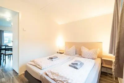Ein Bett oder Betten in einem Zimmer der Unterkunft Charmantes Tiny House in Güls
