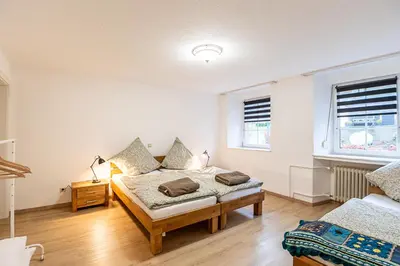 Ein Bett oder Betten in einem Zimmer der Unterkunft Die Alte Gaststätte