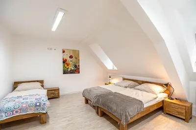 Ein Bett oder Betten in einem Zimmer der Unterkunft Die Alte Gaststätte