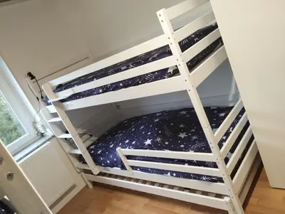 Ein Bett oder Betten in einem Zimmer der Unterkunft Ferienhaus check ferien dot world