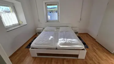 Ein Bett oder Betten in einem Zimmer der Unterkunft Ferienhaus check ferien dot world