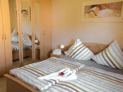 Ein Bett oder Betten in einem Zimmer der Unterkunft Apartment Gästehaus Edith by Interhome