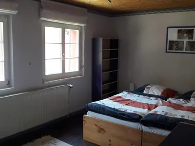 Ein Bett oder Betten in einem Zimmer der Unterkunft Main building Neumühle