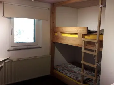 Ein Etagenbett oder Etagenbetten in einem Zimmer der Unterkunft Main building Neumühle