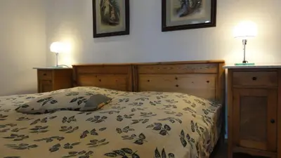 Ein Bett oder Betten in einem Zimmer der Unterkunft Ambiente WeinStein am Markt