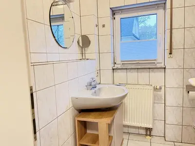 Ein Badezimmer in der Unterkunft Ferienwohnungen Weingut Breit