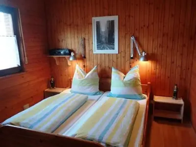 Ein Bett oder Betten in einem Zimmer der Unterkunft Holiday Home Haus Sonnenhang by Interhome