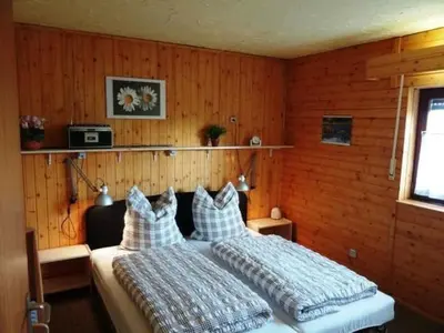Ein Bett oder Betten in einem Zimmer der Unterkunft Holiday Home Haus Sonnenhang by Interhome
