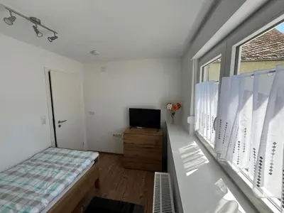 Ein Bett oder Betten in einem Zimmer der Unterkunft Apartment Haus Budinger by Interhome