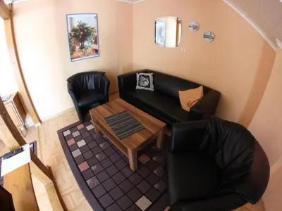 Ein Sitzbereich in der Unterkunft Apartment Haus Budinger by Interhome
